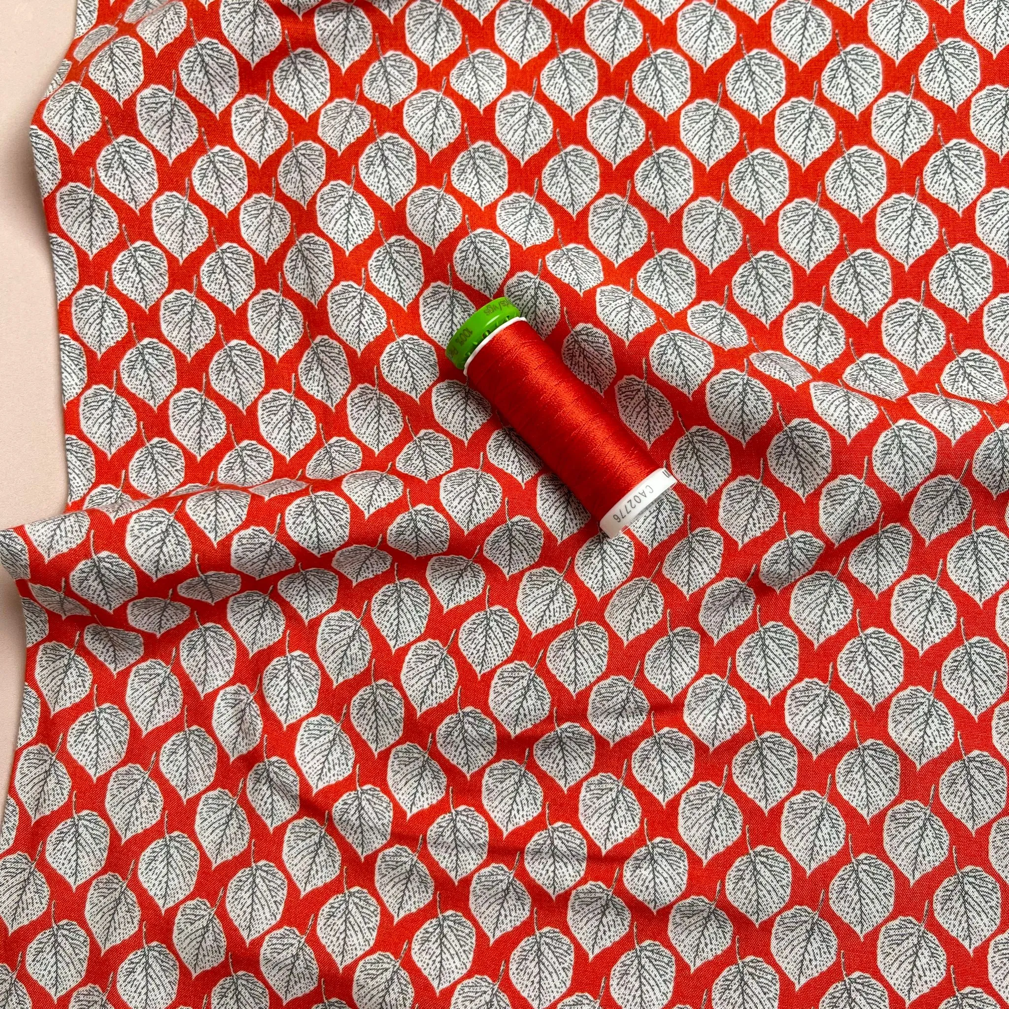 REMNANT 0.79 Metre - Sketched Leaf on Red Viscose Fabric